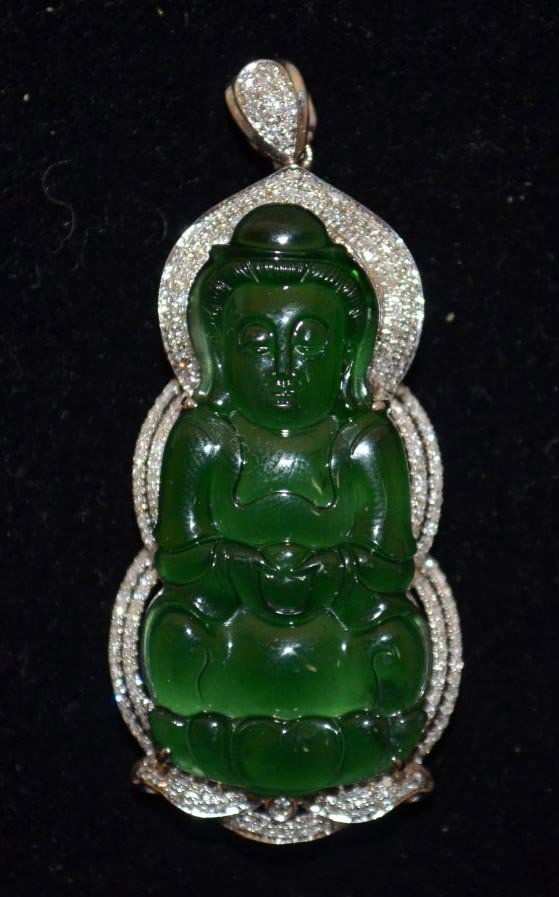18K Carved Natural Jadeite Guanyin Pendant w Diamonds: 18K white gold guaranteed type A carved jadeite Guyanyin pendant with diamonds surrounding. stone:36mm x18mm x3mm aprrox, overall: 50mm x22mm. weight:13.1g approx
