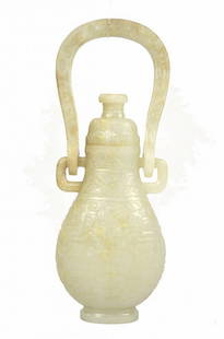 Fine Chinese Carved Jade Lidded Vessel with Handle: Chinese vessel with handle and cover, finely carved all over with banded geometric designs. To top of lid: 7 1/2" x 3 3/4", To top of handle: 10" x 3 3/4" similar was sold in Doyle New York For over 5