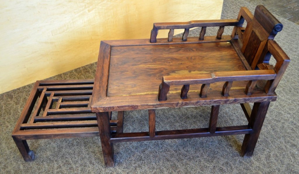 Large Antique Chinese Wood Chair w. Attached Foot Stool: Large six-legged antique Chinese wood chair, with a footstool that pulls out from beneath the seat. 53" x 23 1/2" x 31"