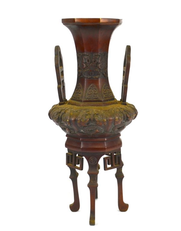 Chinese Bronze Tall Footed Incense Burner: Tall Chinese bronze footed incense burner with two elongated handles, the stylized bird, dragon, and foo dog design. 14" x 6 1/2"