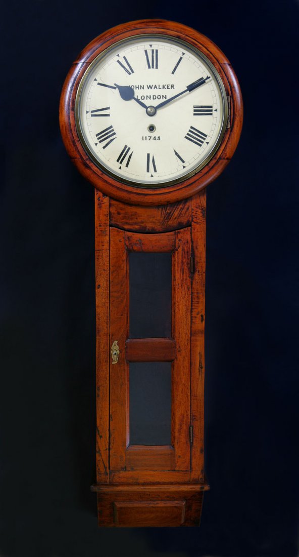 A John Walker Victorian Railway Regulator in a drop: A John Walker Victorian Railway Regulator in a drop dial style with walnut case.