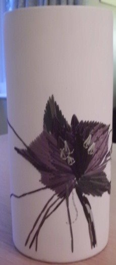 Ceramic Gilles Caffier vase: A Ceramic hand decorated vase with detachable glass liner by Gilles Caffier- a French art potter. Parisian designer Gilles Caffier uses ceramics as the medium for pieces like the Turtle Lamp, whose ea