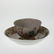 A Chinese Tea Bowl and Saucer. 18th century. Decorated