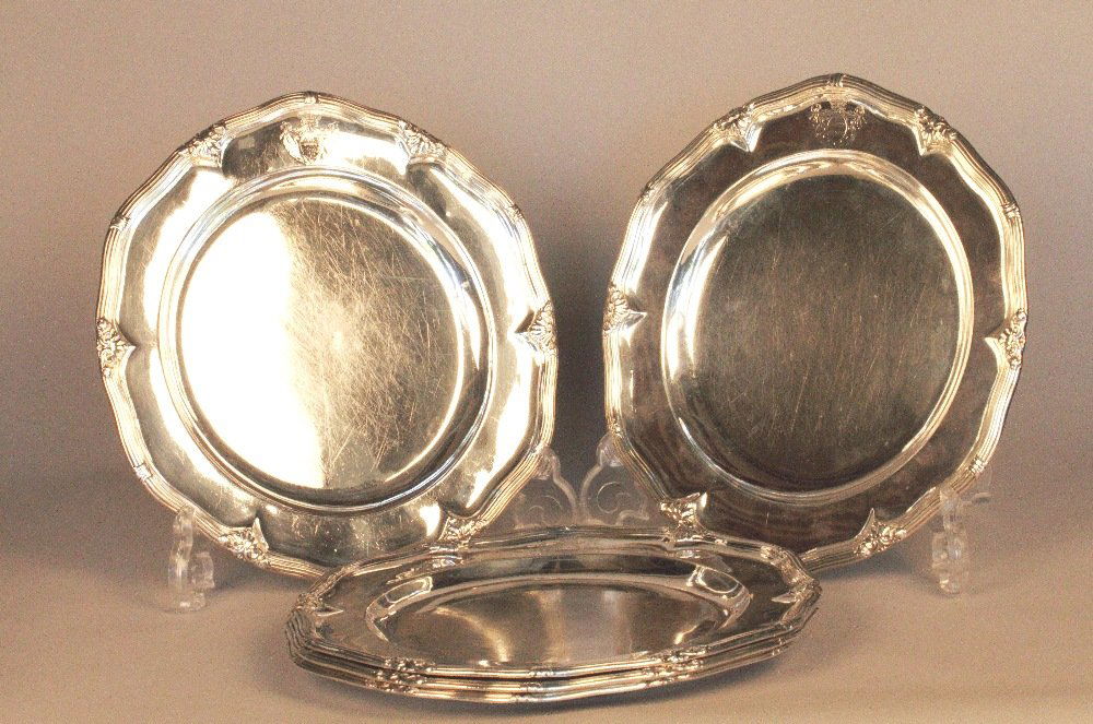 A set of 10 silver plates (1 of 3)
