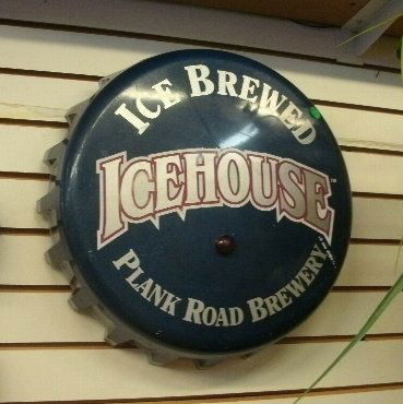 BOTTLE CAP STYLE ICE HOUSE BEER SIGN!: BOTTLE CAP STYLE ICE HOUSE BEER SIGN! ICE HOUSE -PLANK ROAD BREWERY HAS A RED LIGHT IN THE MIDDLE-WORKS! FUN-LOOKING SIGN! WOULD LOOK GREAT IN ANY BAR OR REC ROOM! WORKING CONDITION! 13" Diameter