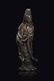 A bronze figure of standing Guanyin with silver inlays
