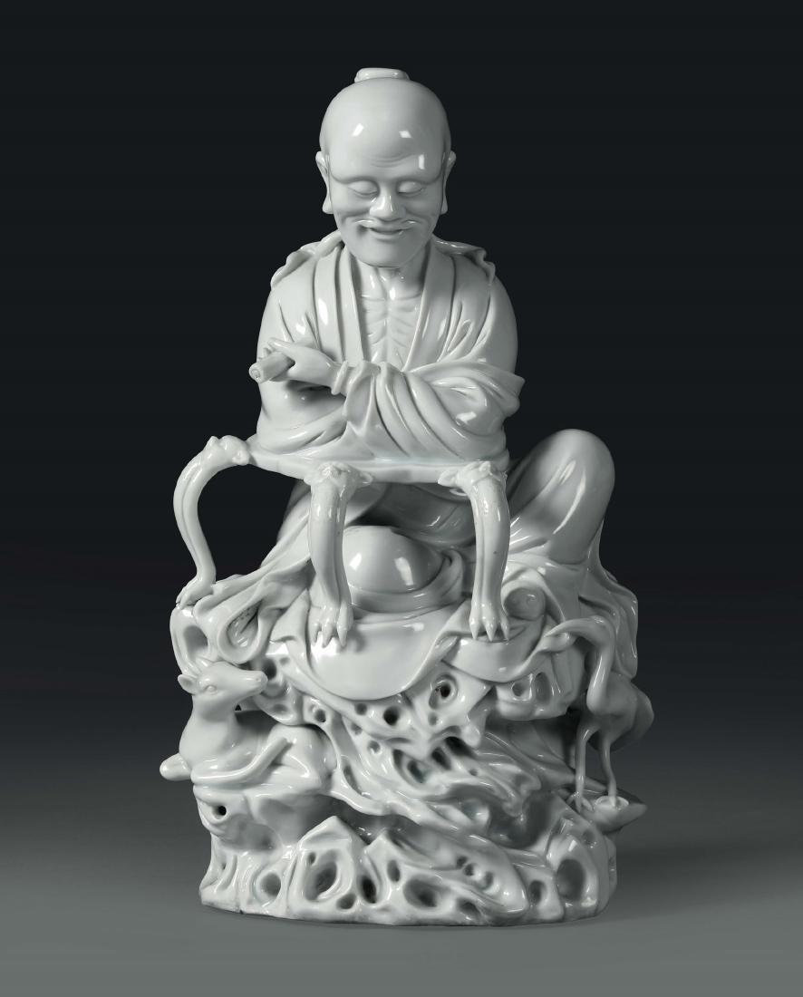 A sitting wiseman in Blanc de Chine porcelain, China, (1 of 4)