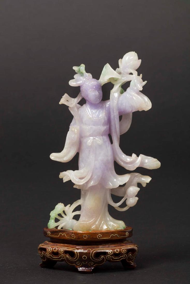 A small lavander shades jadeite figure of Guanyin, (1 of 1)