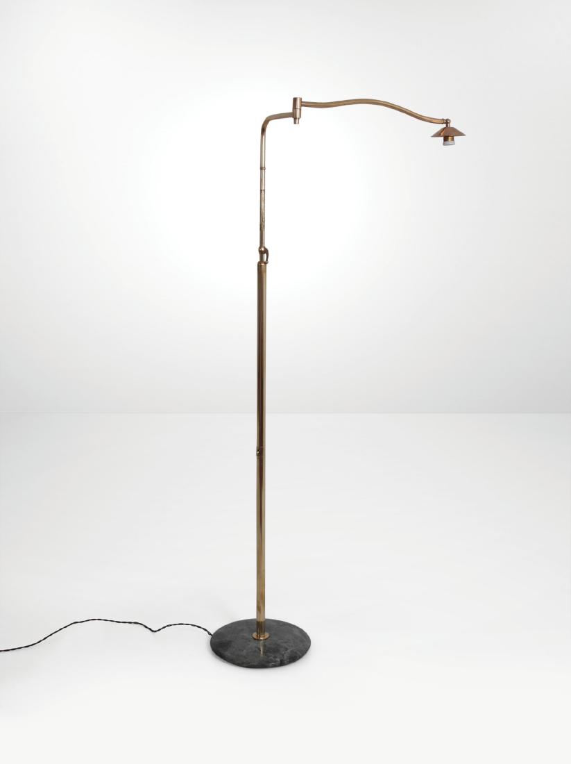 An adjustable and extendable reading lamp with a brass (1 of 1)