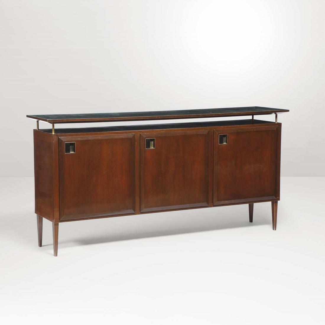 A sideboard with a wooden structure, brass elements and (1 of 1)