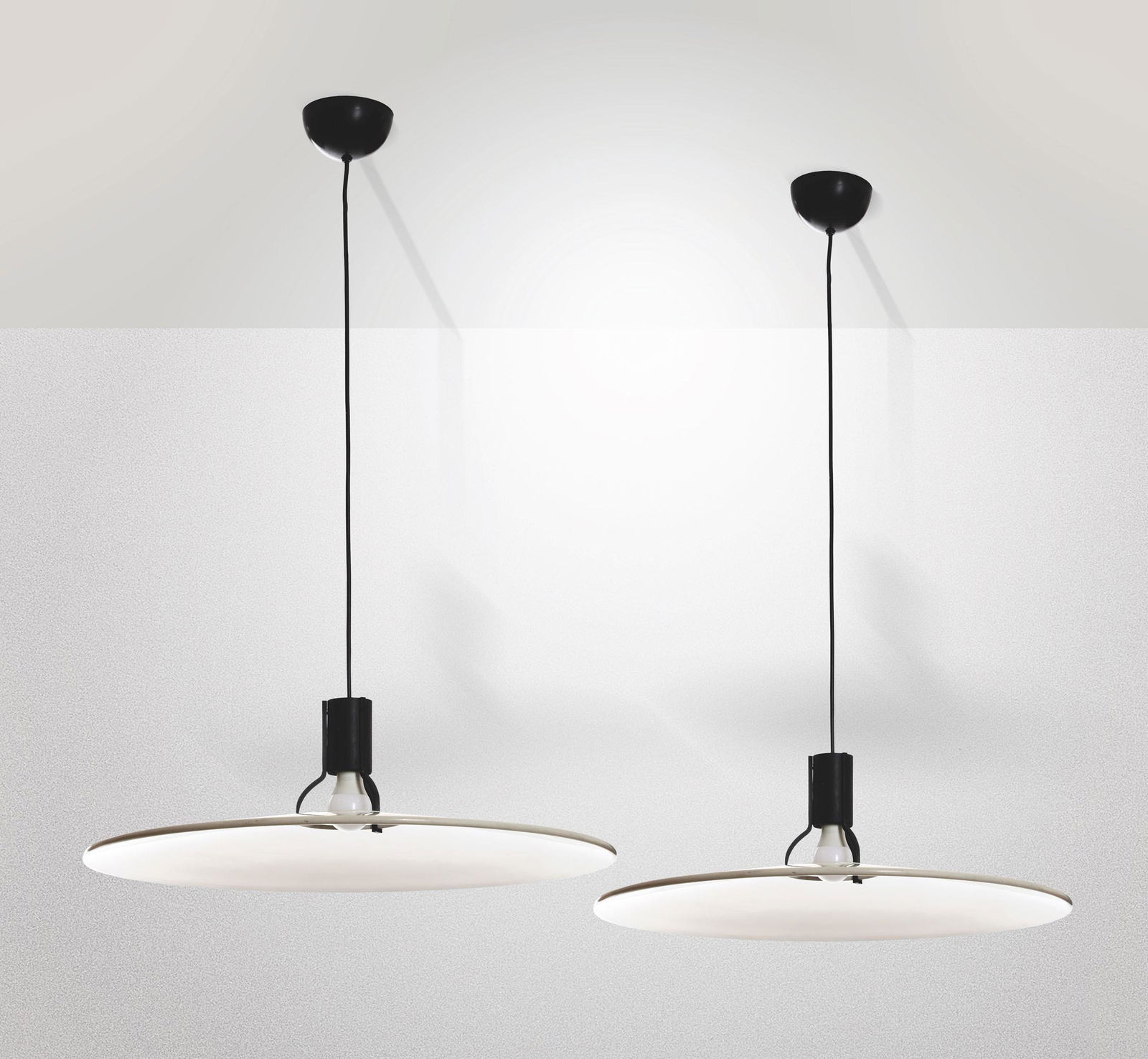 G. Sarfatti, two mod. 2133 pendant lamps, Italy: Aluminium and lacquered aluminium structure. First edition. Original Decalcomania. Prod. Arteluce, 1970s. 68x100cm. Bibliography: M. Romanelli,