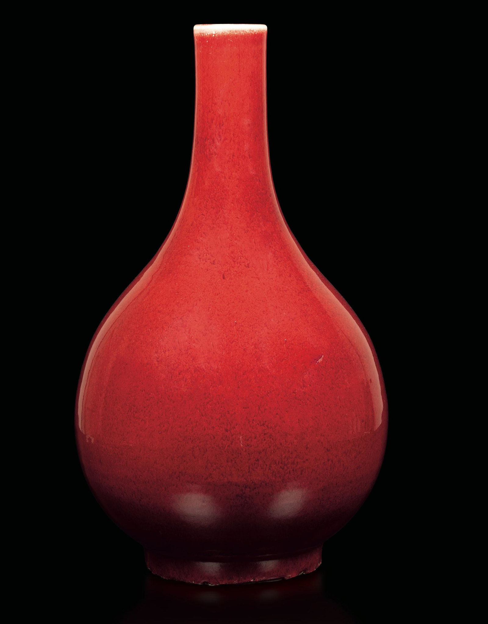 An oxblood porcelain vase, China, Qing Dynasty (1 of 3)