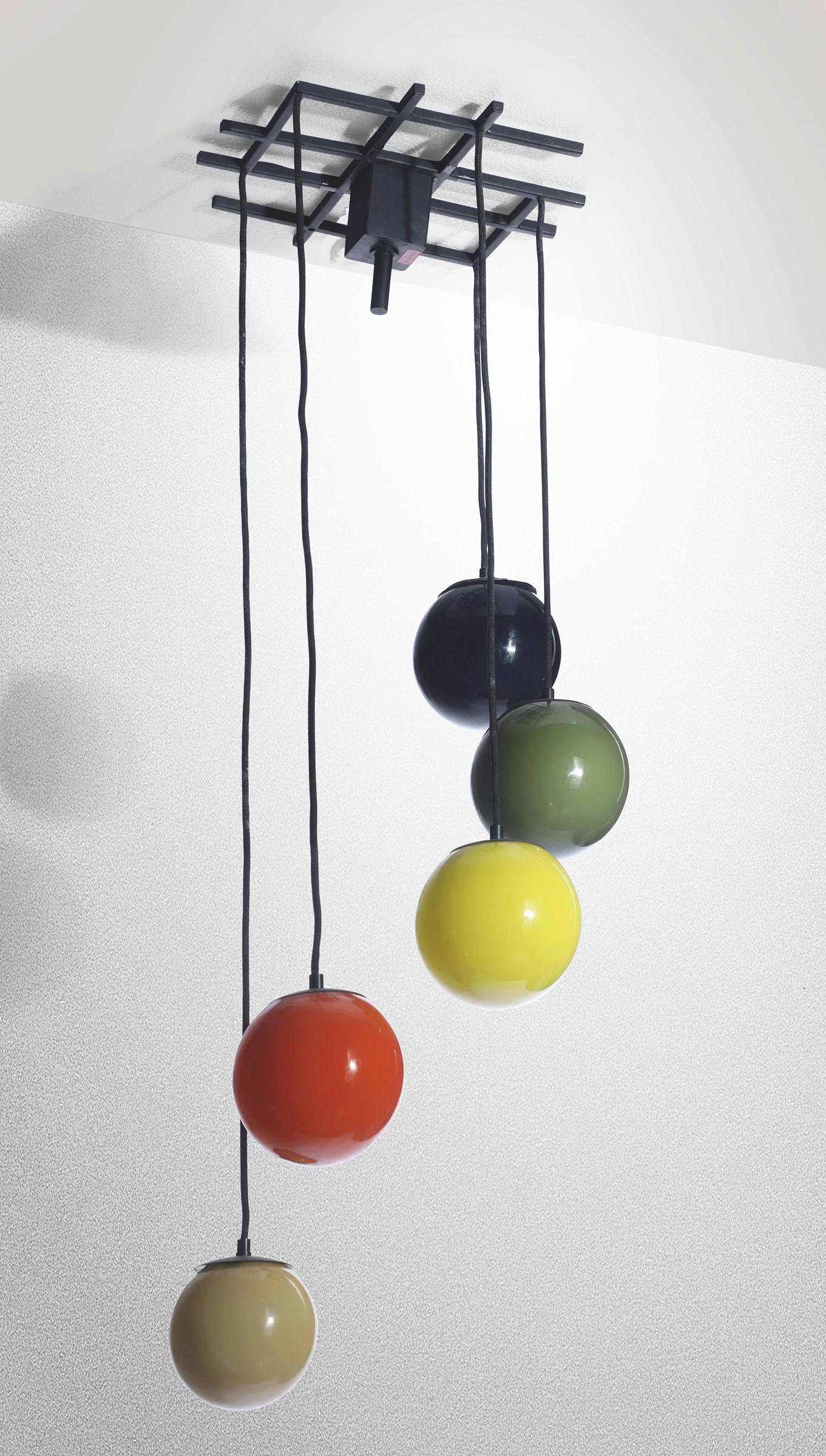 Stilnovo, a pendant lamp, Italy, 1950s: Lacquered metal structure, brass details and coloured glass diffusers. 40x40x105cm.