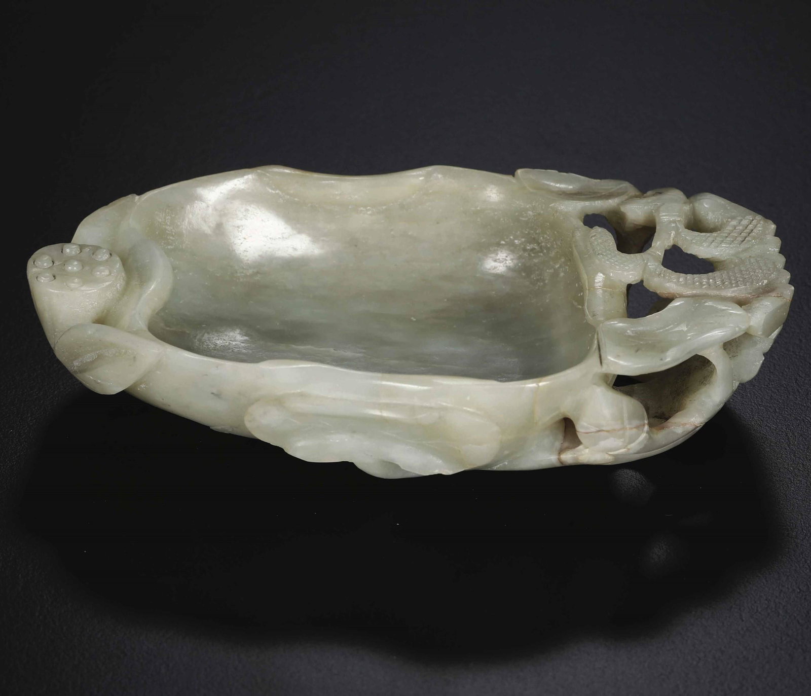 A Celadon jade bowl, China, Qing Dynasty: Qianlong period (1736-1796). 3.5x15x8