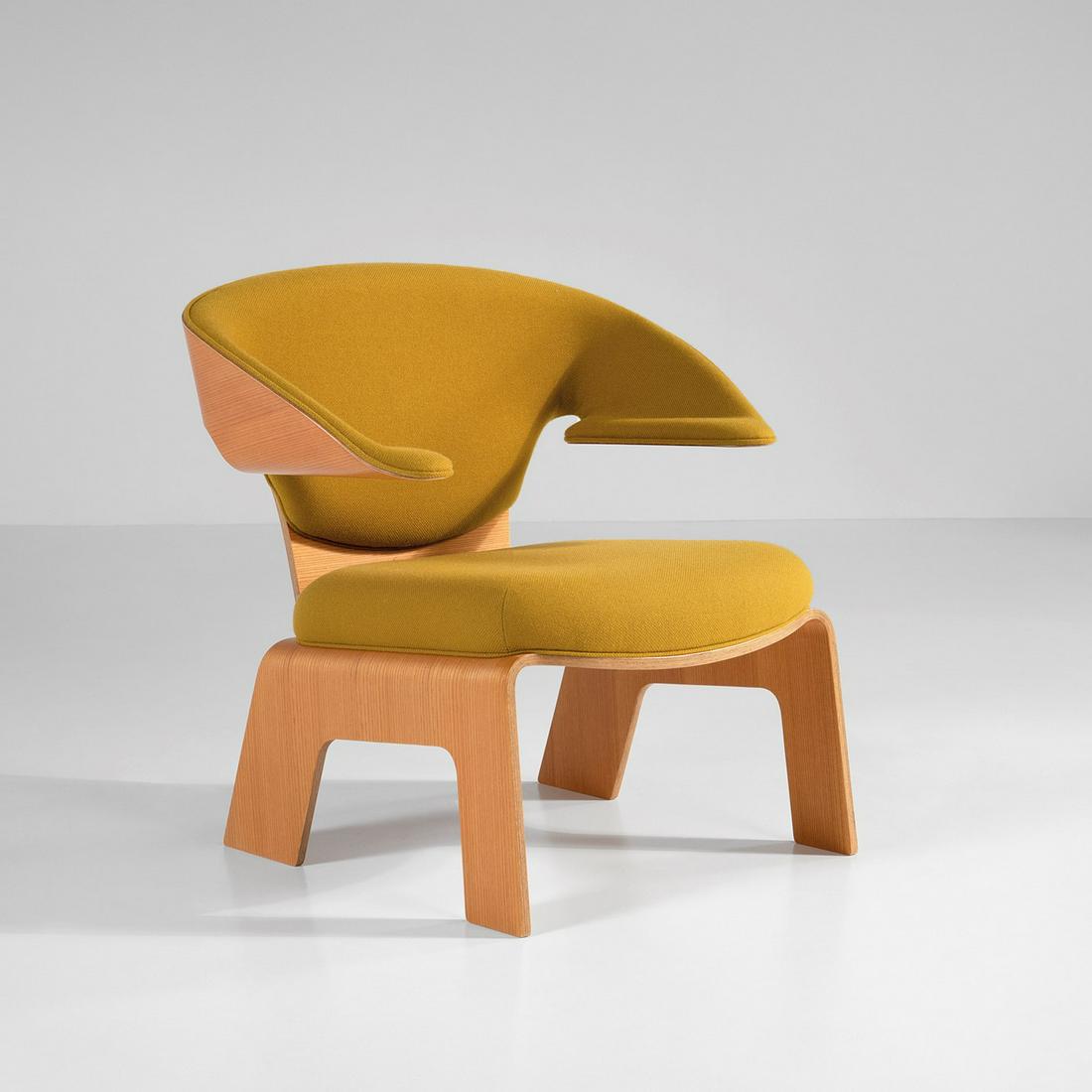 Kenzo Tange,: Armchair with plywood frame. Fabric upholstery. Production label.Original project, c. 1950. Tendo Mokko, Japan, c. 2000. cm 75x62x75