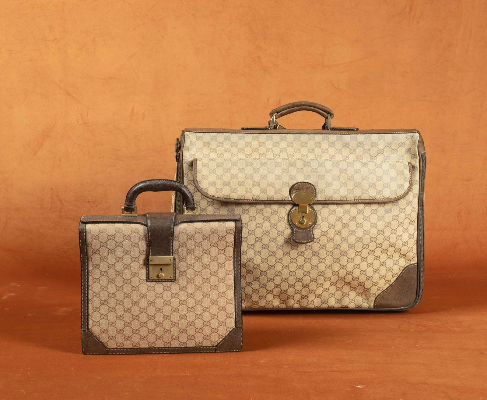 A suitcase and a briefcase, Gucci: Original GG fabric, With defects