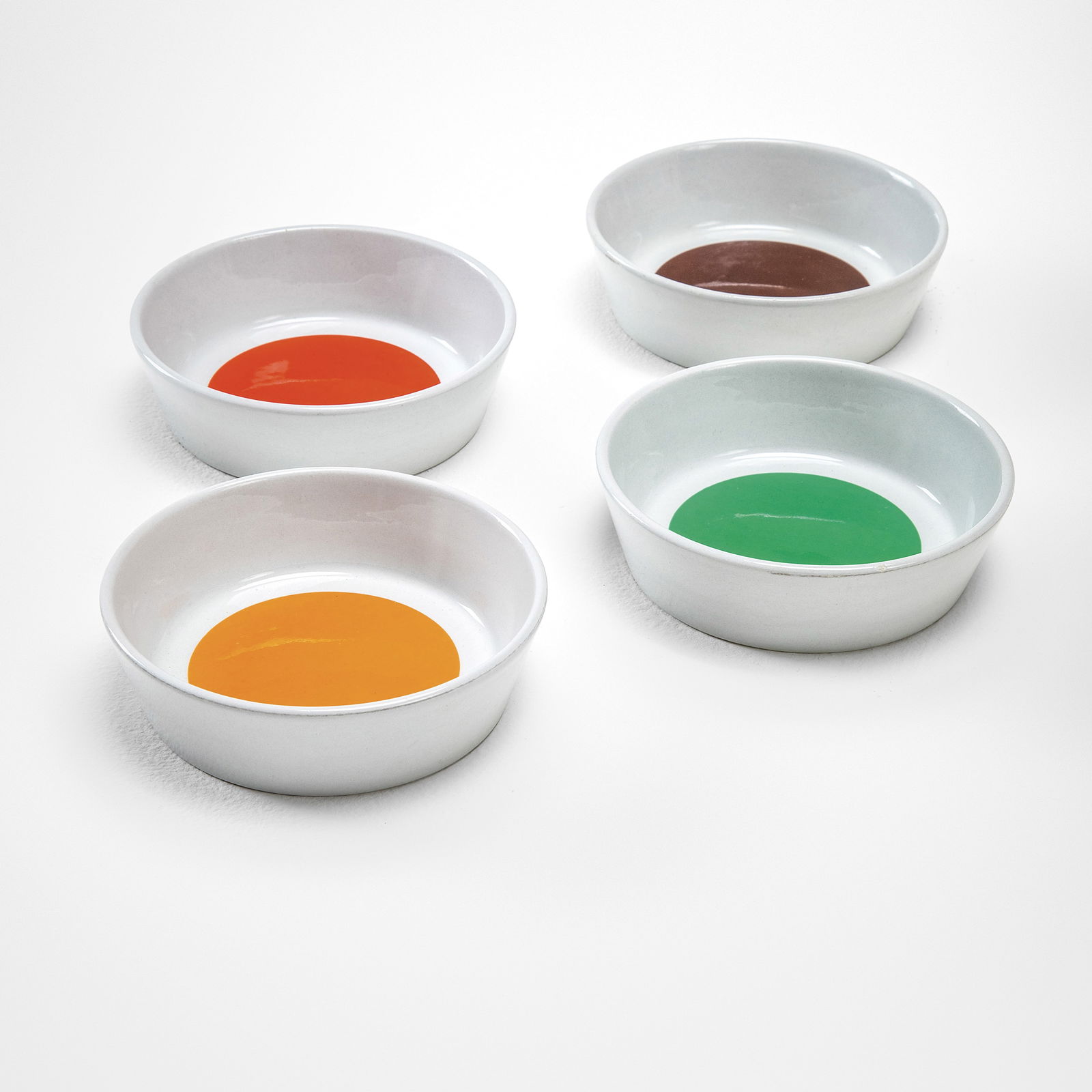 Gio Ponti Set di quattro piatti fondi della serie Fantasia Italiana.: Ceramica decorata a calcomania.Marchio della produzione.Prod. Ceramiche Franco Pozzi, Italia, 1967 BibliografiaDomus n. 450, maggio 1967@@@ S. Bouilhet-Dumas, D. Forest, S. Licitra, Gio Ponti Archi-De