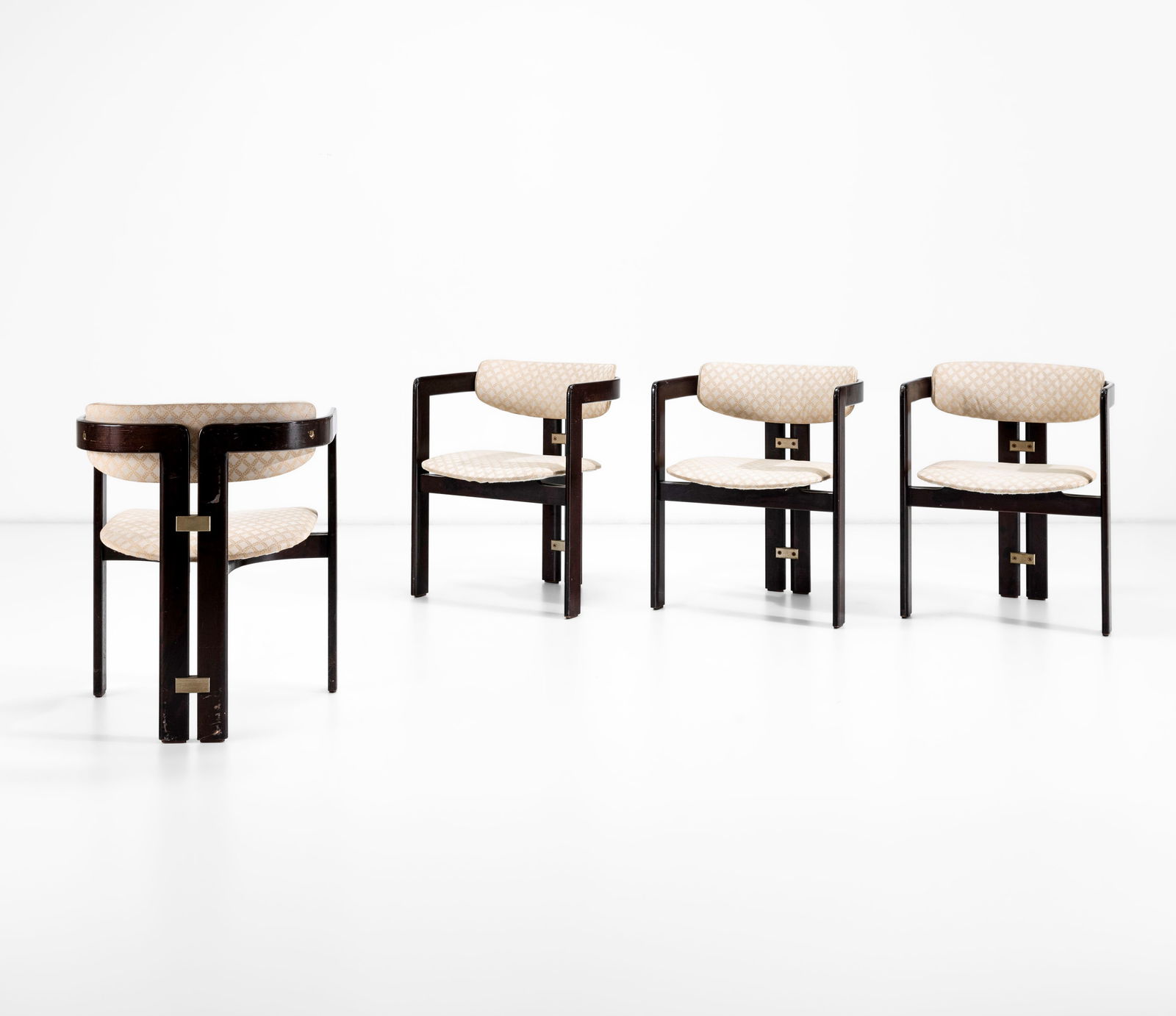 Augusto Savini Quattro sedie mod. Pamplona: Struttura in legno, rivestimenti in tessuto e particolari in metallo nichelato.Prod. Pozzi, Italia, 1970 ca. Domus n.483, 1970