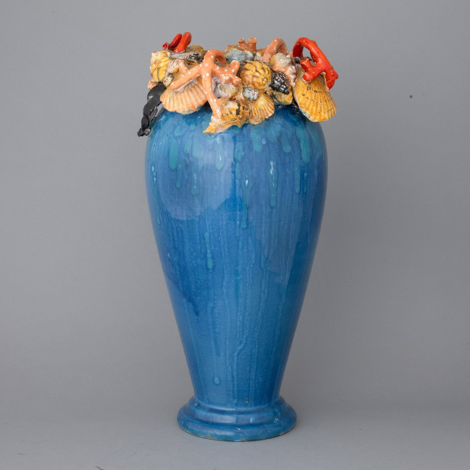 Sesto Fiorentino 1960s: Large balustrade vase in blue earthenware majolica with decorated neck of corals sculptures and shells with polychrome enamels.Marked AF 61.