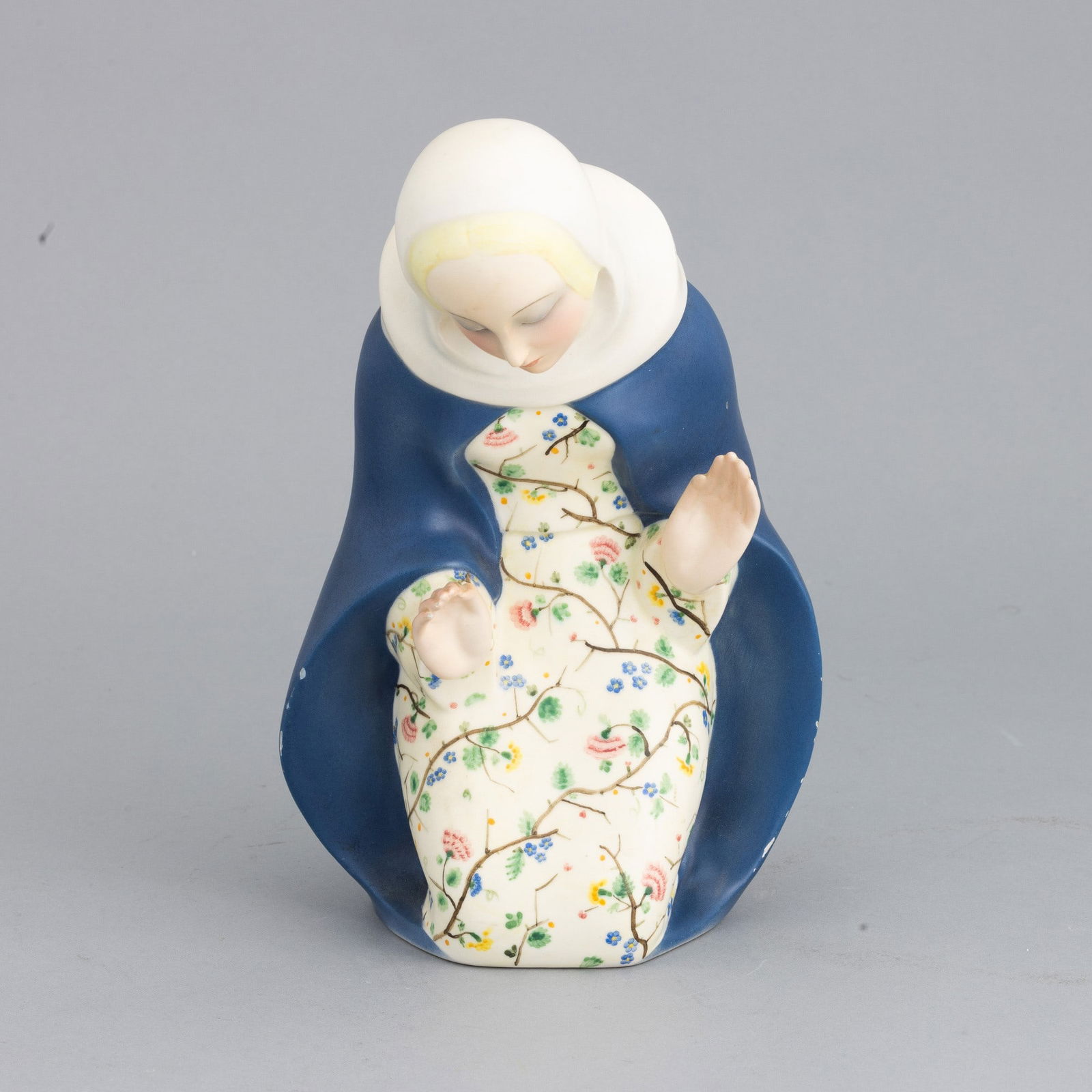 Paola Bologna 1898-1960 Lenci, Turin 1933: Earthenware figure of Madonna with polychrome decoration.Manufacturer’s mark and date at base.Slight defects. A. Panzetta, a cura di, Le ceramiche Lenci. Catalogo dell'archivio storico 1928-1964, Al