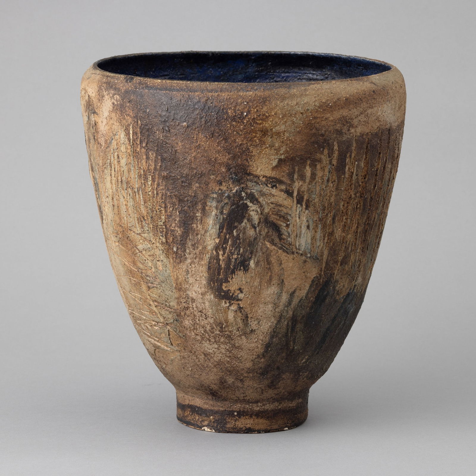 Nanni Valentini 1932-1985 Vaso Graffito 1960s: Gres vase on a cylindrical foot with scratched surface and polychrome matt enamels.Author’s signature and traces of old label.