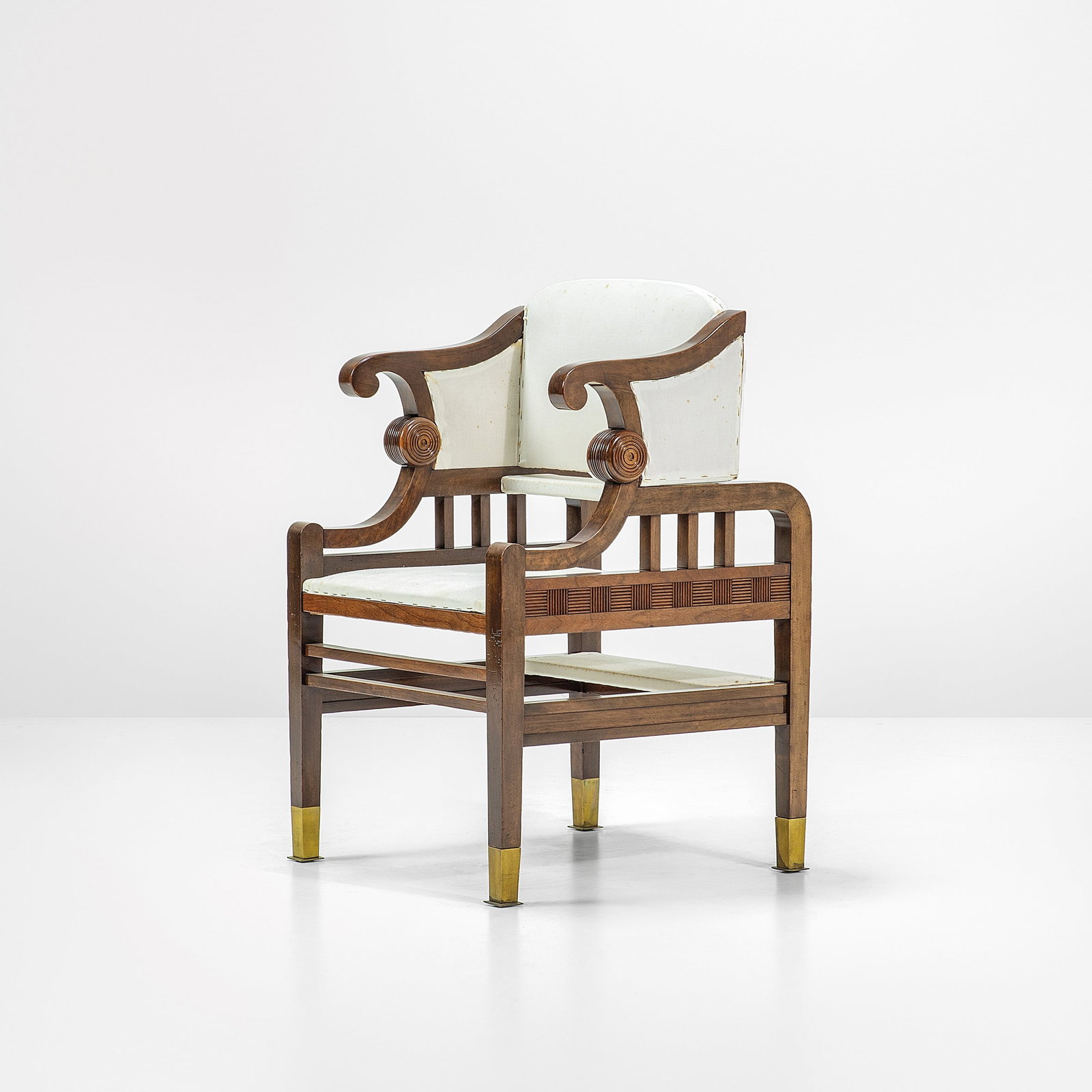 Friedrich Otto Schmidt, Adolf Loos Ladder armchair.: Wooden structure and fabric upholstery.Brass finials. Geometric decorative frieze based on a design by Adolf Loos.Original maker's mark.From the private collection of Amalia Glanzmann and acquired by