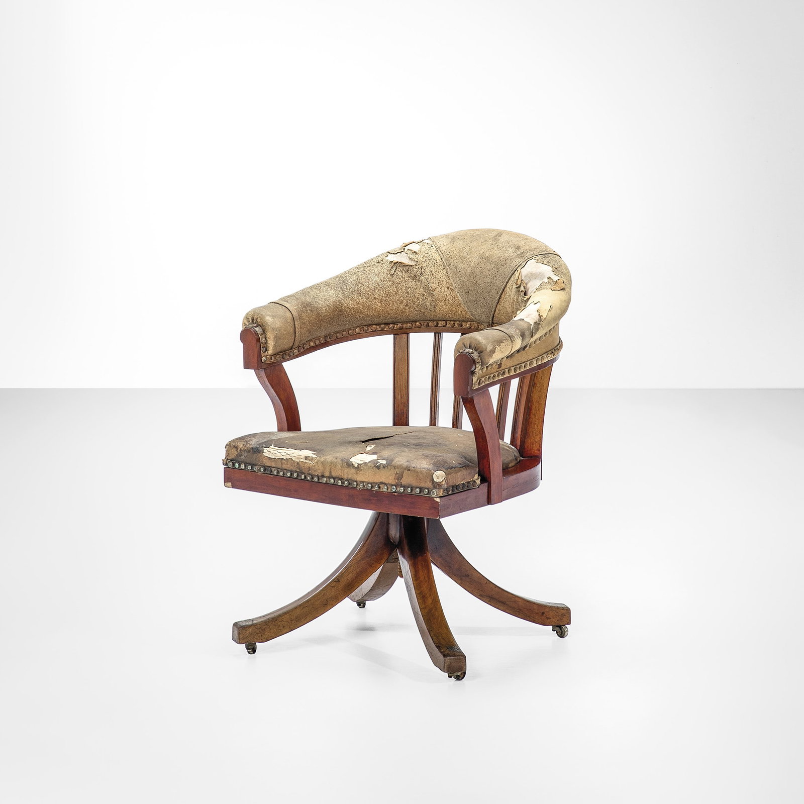 Friedrich Otto Schmidt Revolving chair.: Wooden structure, brass details. Fabric upholstery.A similar model was used by Adolf Loos for the furnishings of Arthur and Leonie Friedman's apartment.From the private collection of Amalia Glanzmann,