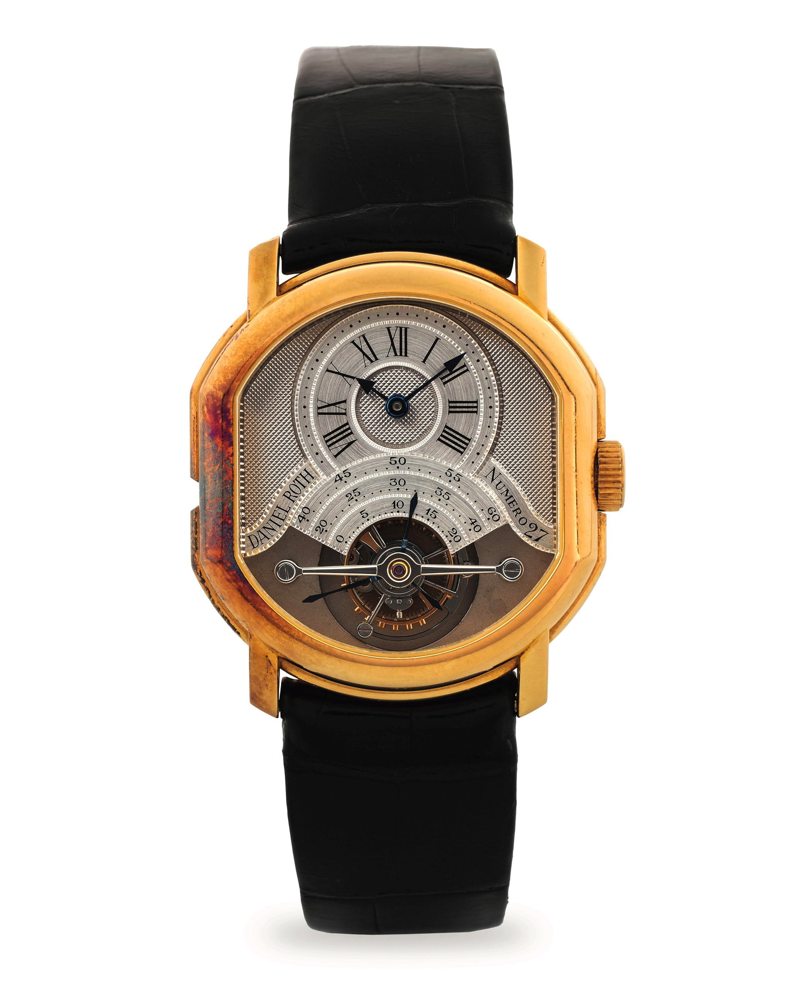 Daniel Roth Tourbillon 2187 in yellow gold 18k, argenté Clous de Paris and satin dial, circa 1990: Brand: Daniel Roth Model: Tourbillon Year: circa 1990 Reference: 2187 Dial: Argenté Clous de Paris and satin dial Case N°: 27 Movement: Manual wind Cal: DR307 Material: Yellow gold 18k Bracelet: Lea