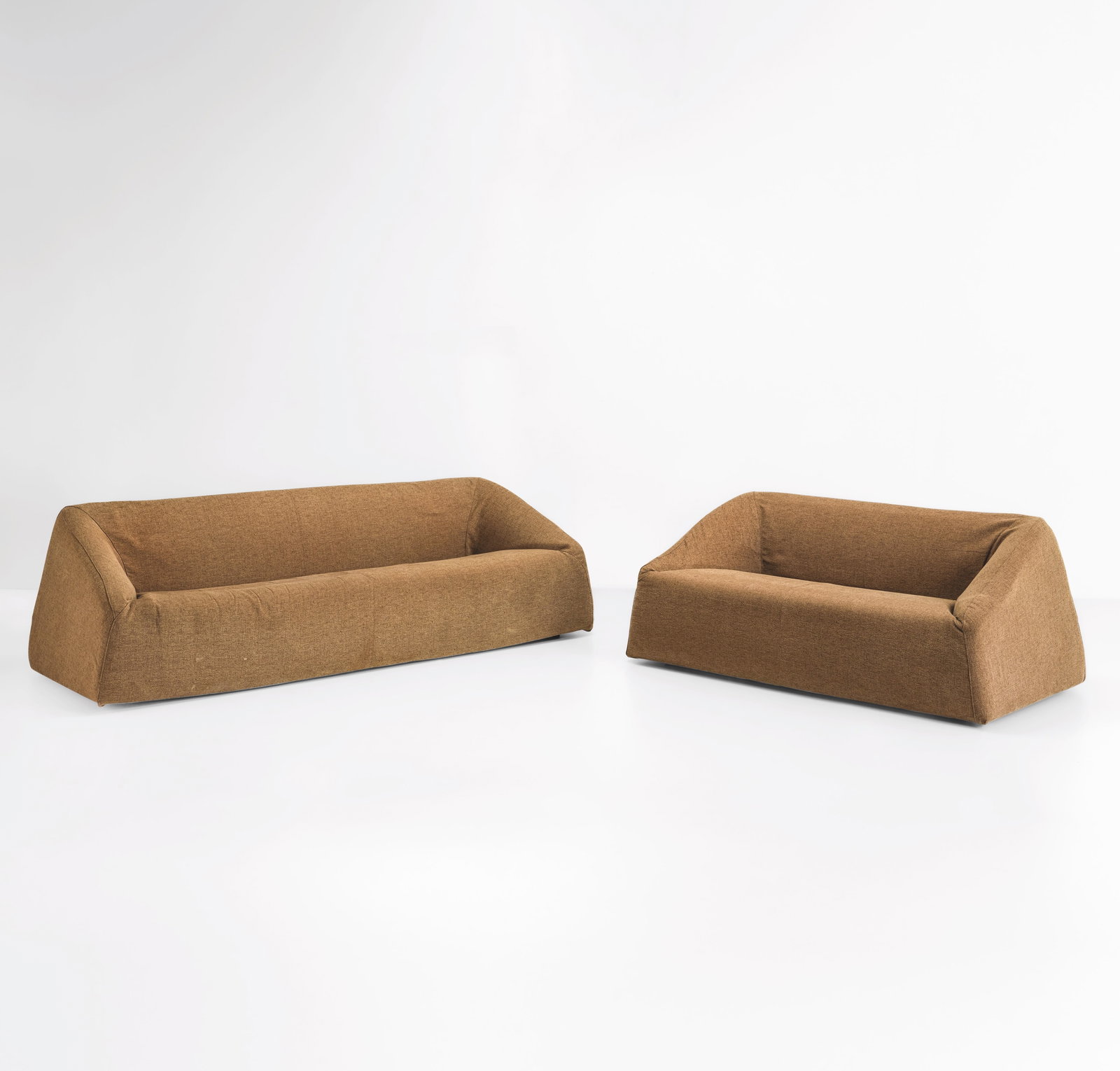 Kazuhide Takahama Due divani mod. Siviglia: Struttura in legno e poliuretano espanso. Rivestimento in tessuto. Prod. Simon Gavina, Italia, 1996. Catalogo: Simon, Collezione Gli Autori, pp. 90,91