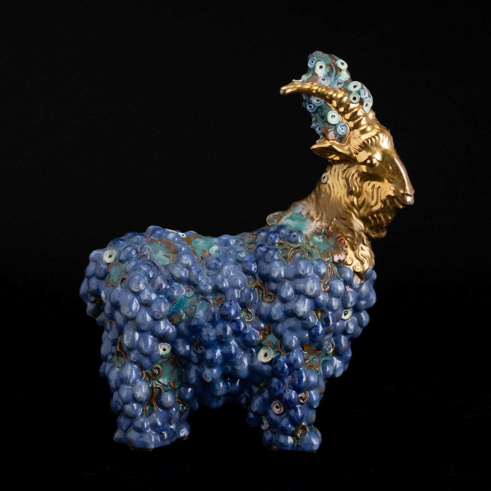 Michael Powolny 1871-1954 M. Powolny, Vienna 1910 ca: An earthenware sculpture with a polychrome enamel and gilt decor. Stamped manufacturer's mark E. Frottier, Michael Powolny: Keramik und Glas aus Wien 1900 bis 1950, Vienna 1990, fig. 37, altezza cm 33