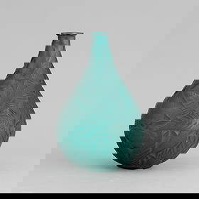 René Lalique 1860-1945 R. Lalique, France 1930 ca: A moulded crystal Sauge vase with a tropical leaf decor. Stamped signature and old retailer label. Chipped part F. Marcilhac, a cura di, René Lalique, 1860-1945, maître-verrier analyse de l’œuvre