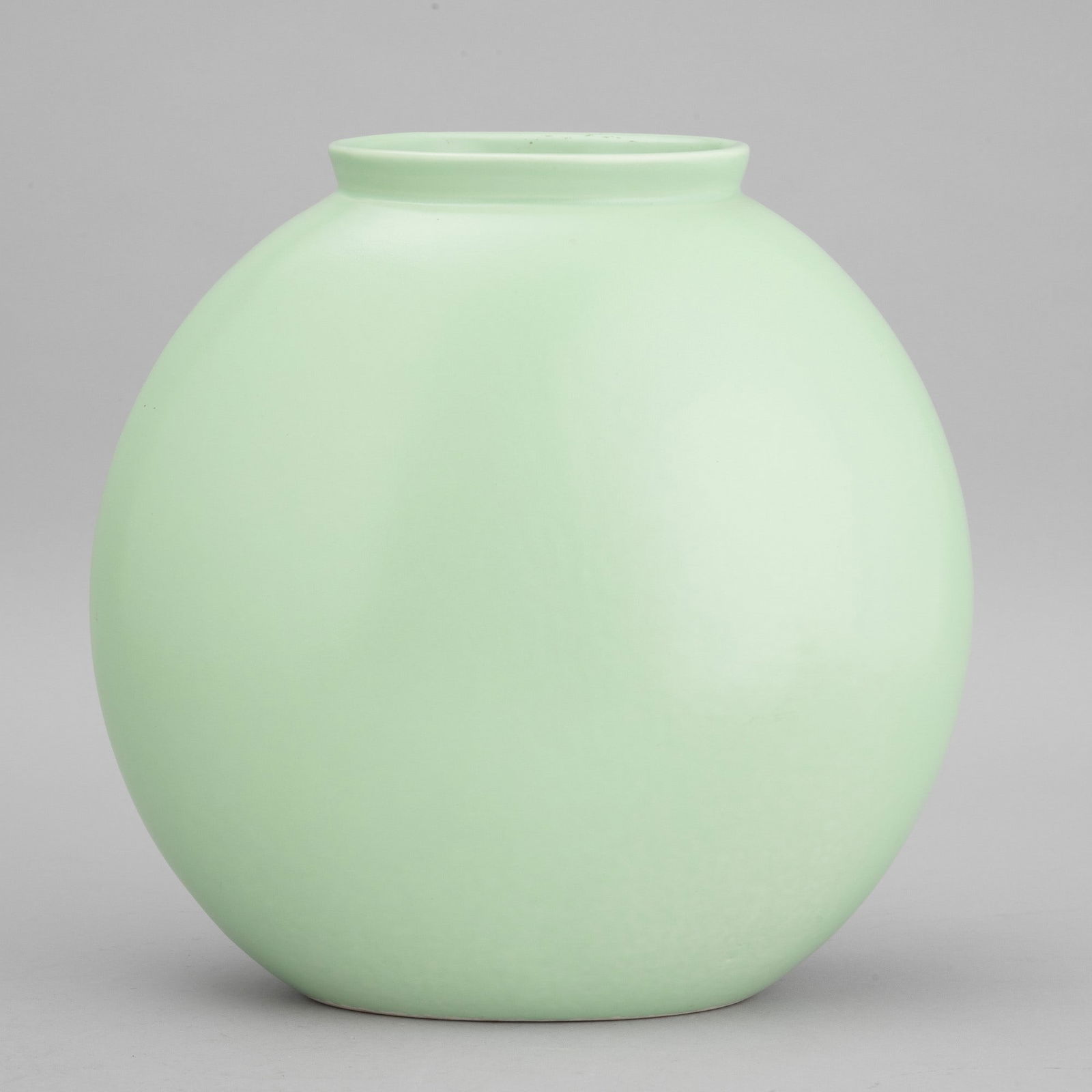 Guido Andloviz 1900-1971 G. Andloviz, S.C.I., Laveno 1935 ca: A slip-cast earthenware vase with a crystalised enamel decor. Stamped manufacturer's mark, altezza cm 25 larghezza cm 25