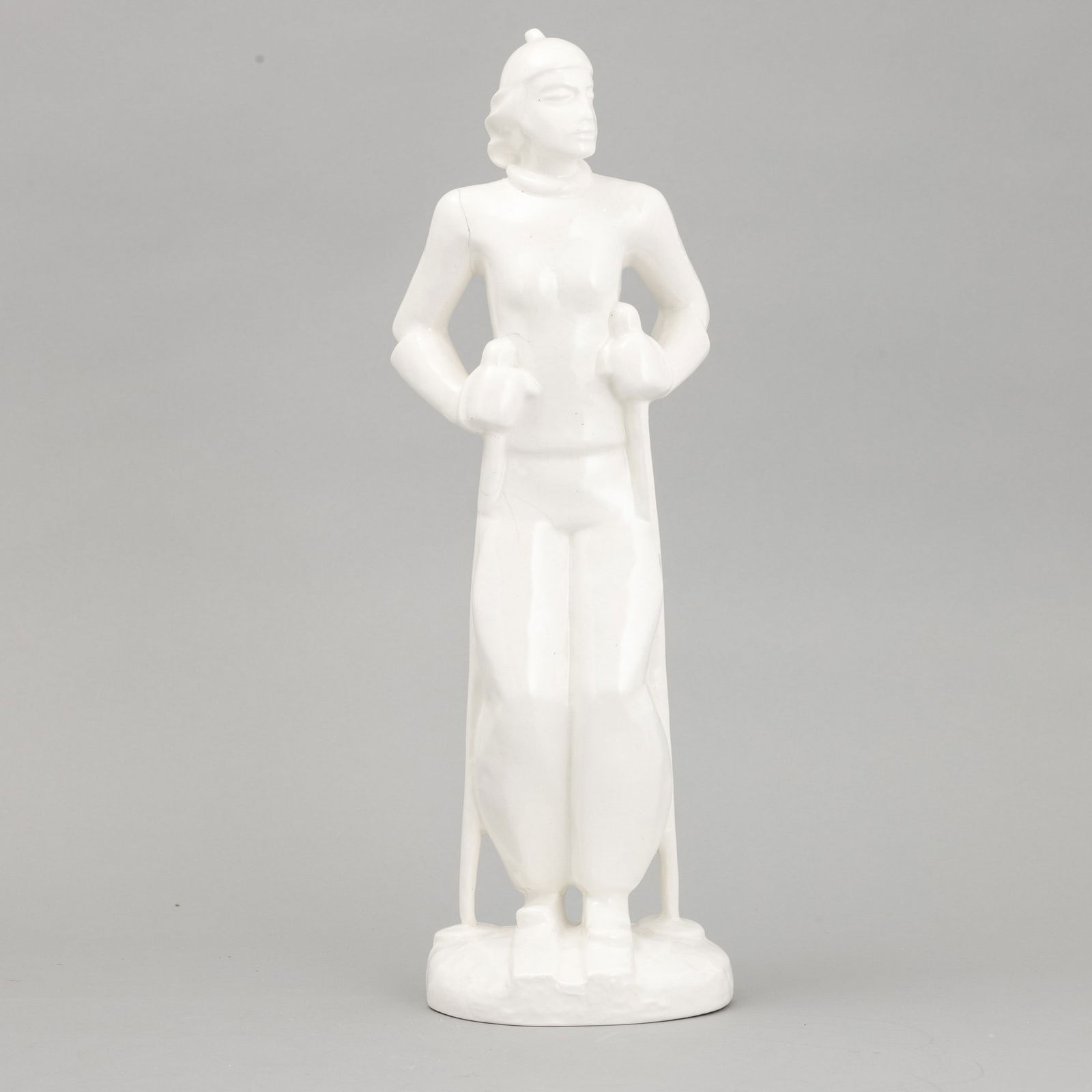 Angelo Biancini 1911-1988 A. Biancini, S.C.I., Laveno 1940 ca: A slip-cast earthenware figurine of a skier. Manufacturer's mark. Broken part on one arm, altezza cm 40