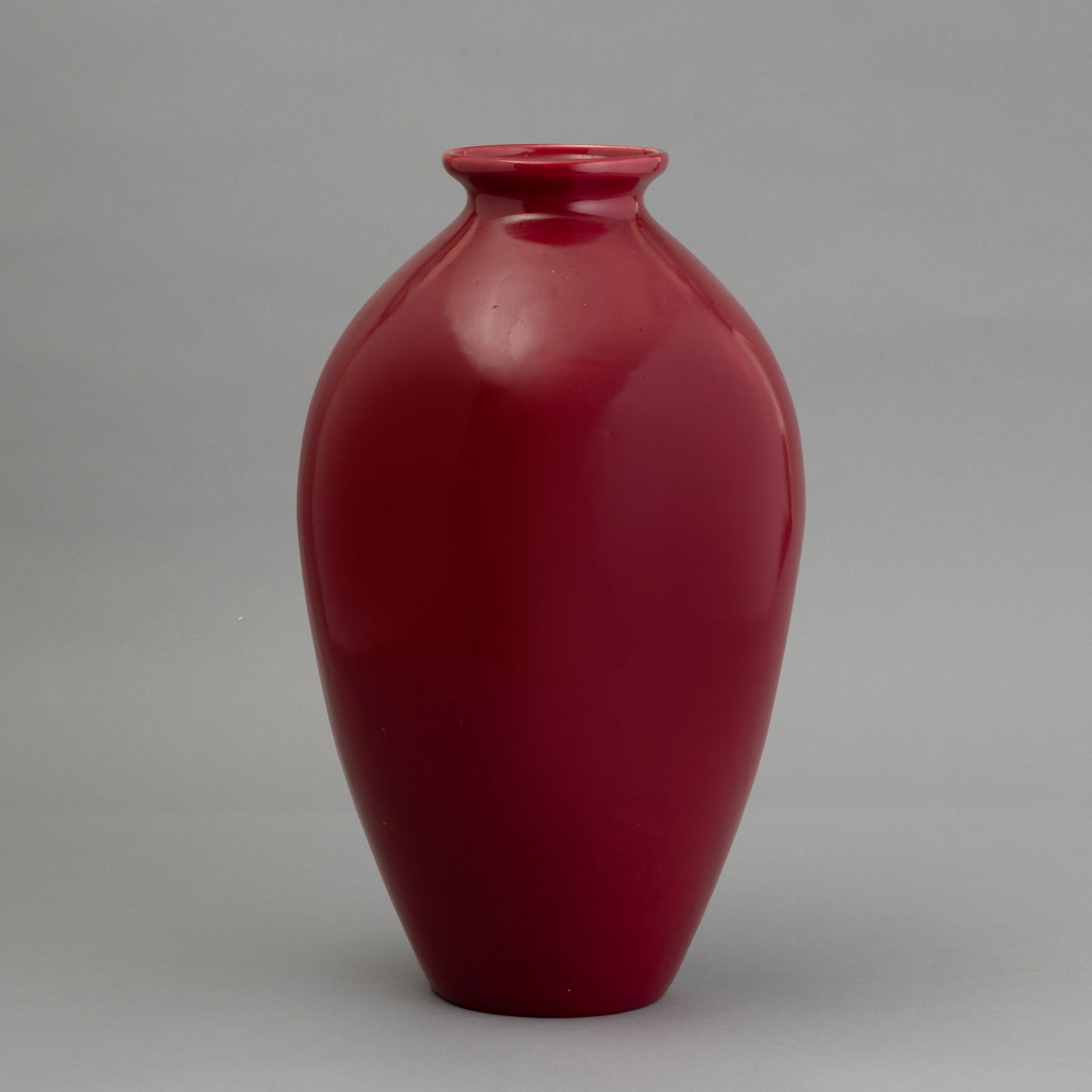 Guido Andloviz 1900-1971 G. Andloviz, S.C.I., Laveno 1940 ca: A slip-cast earthenware vase with an enamel decor. Manufacturer's mark, altezza cm 43