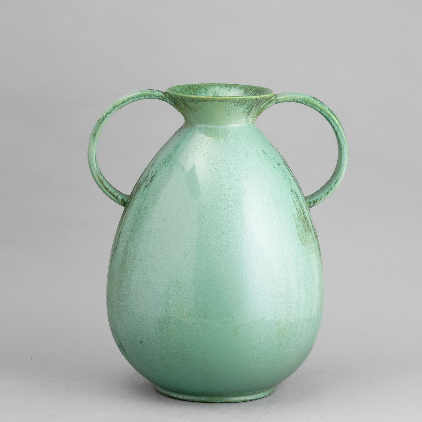 Guido Andloviz 1900-1971 G. Andloviz, S.C.I., Laveno 1953: A large slip-cast earthenware vase with an enamel decor. Manufacturer's mark, altezza cm 40