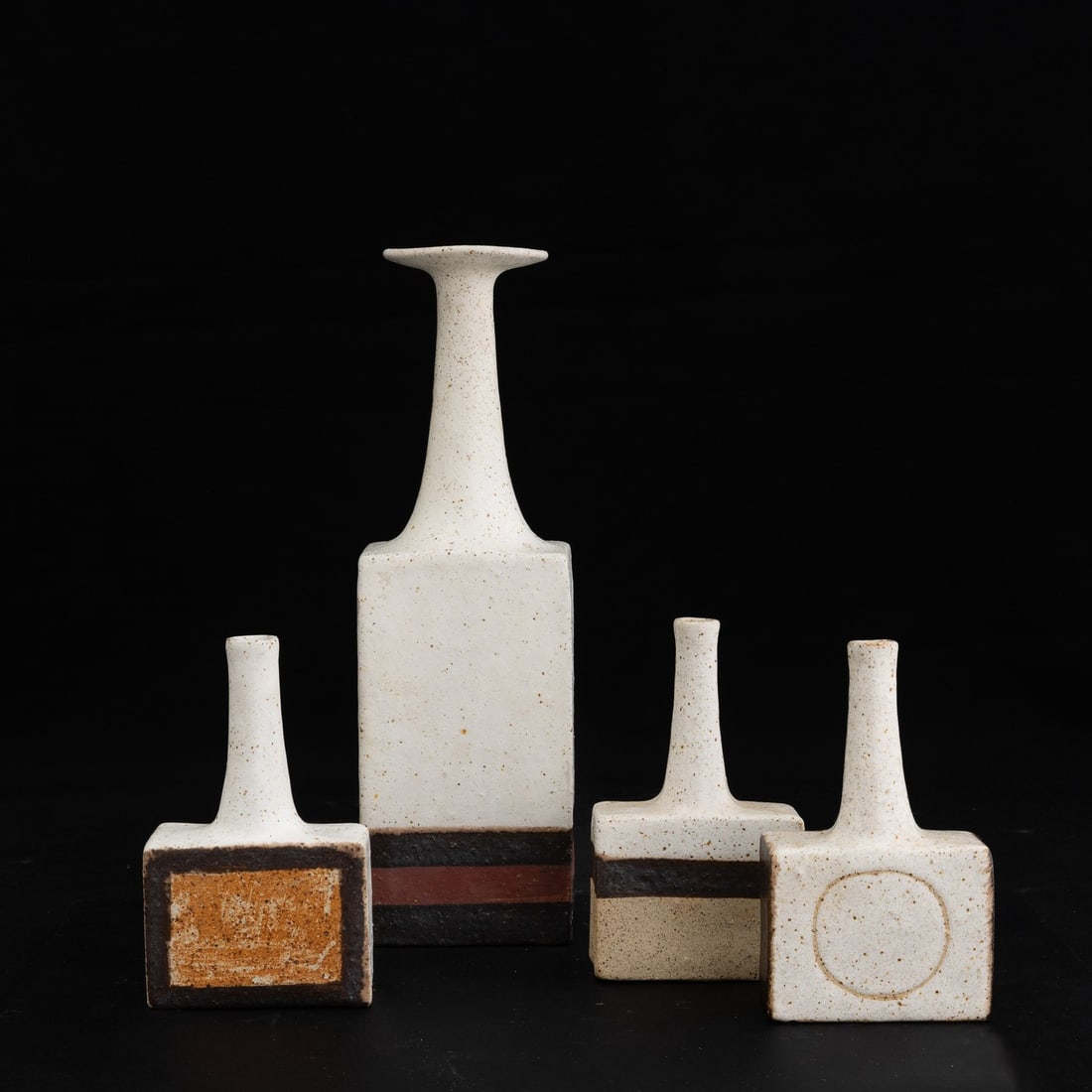 Bruno Gambone 1936-2021 B. Gambone, Florence 1960 ca: Four grès vases with a polychrome decor. Author's signature, altezza da cm 13 a 27