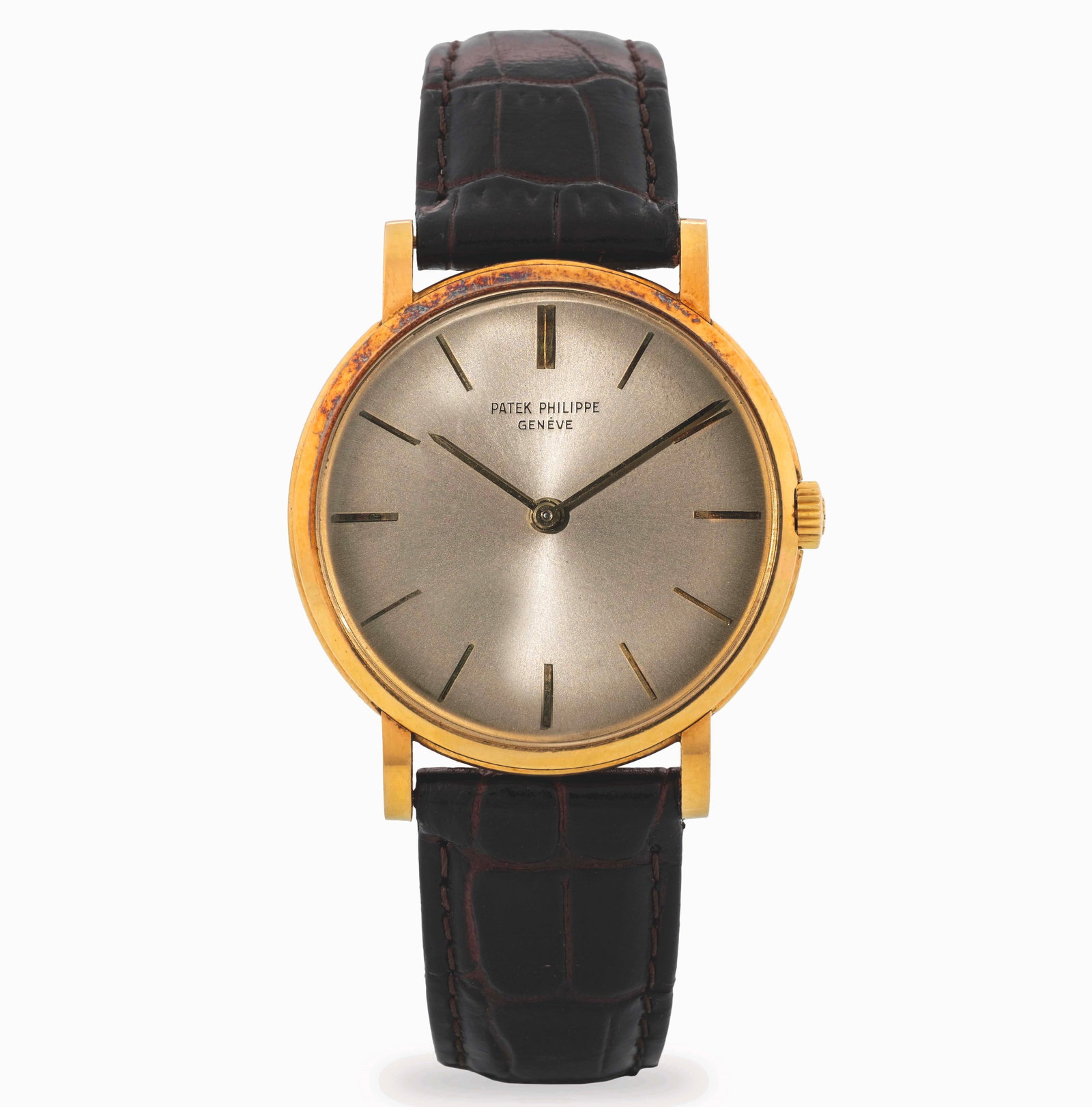 Patek Philippe Calatrava in 18k yellow gold with silvered dial and applied indexes, circa 1960 (1 of 6)
