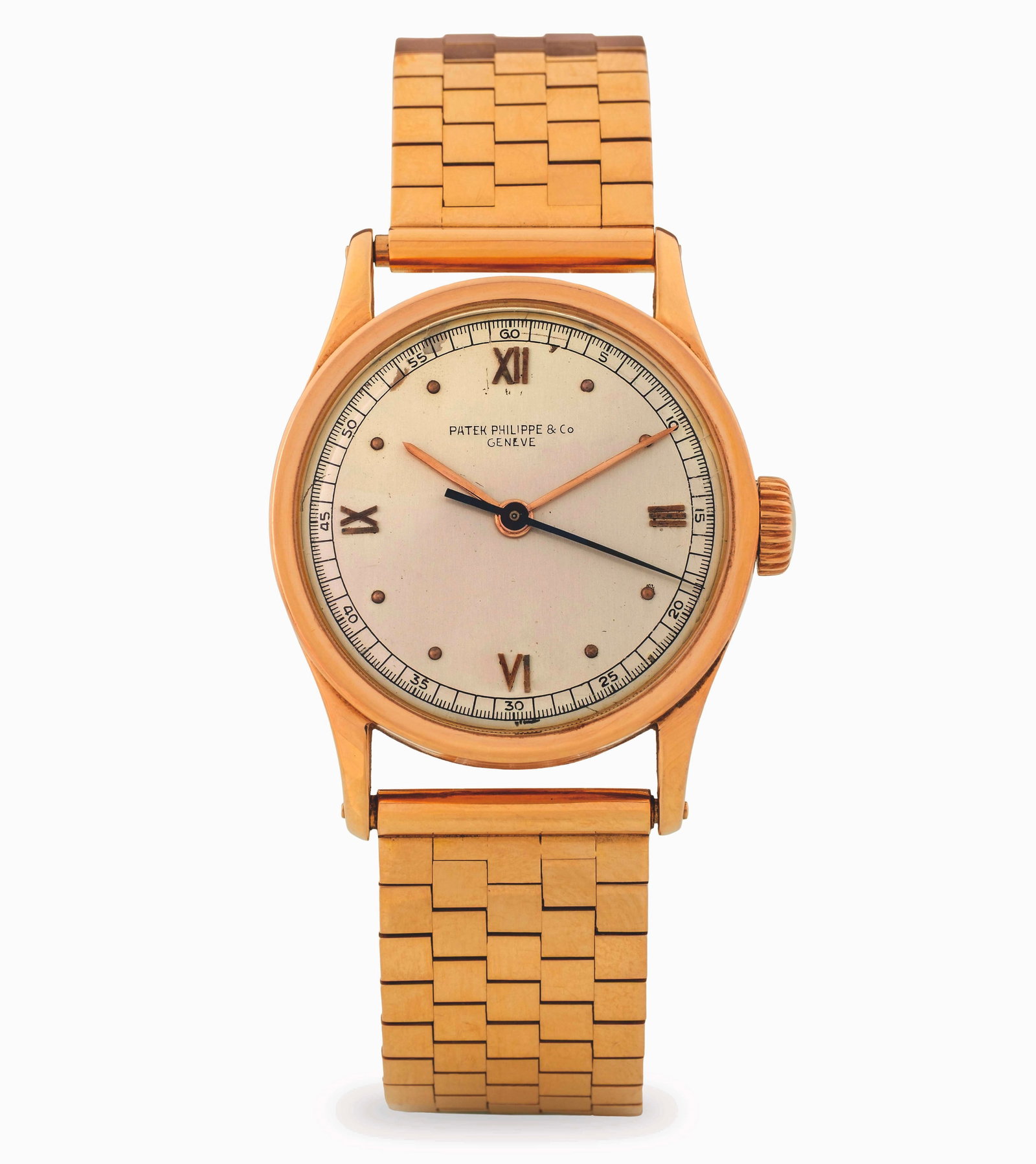 Patek Philippe Rare Calatrava 96 in 18k pink gold with original pink gold bracelet, silvered dial: Brand: Patek Philippe Model: Calatrava Year: circa 1938 Reference: 96 SC Dial: Silvered with Roman numerals Case N°: 295.XXX Movement: Manual Cal: 12-120 Movement N°: 828.XXX Material: Pink gold 18k