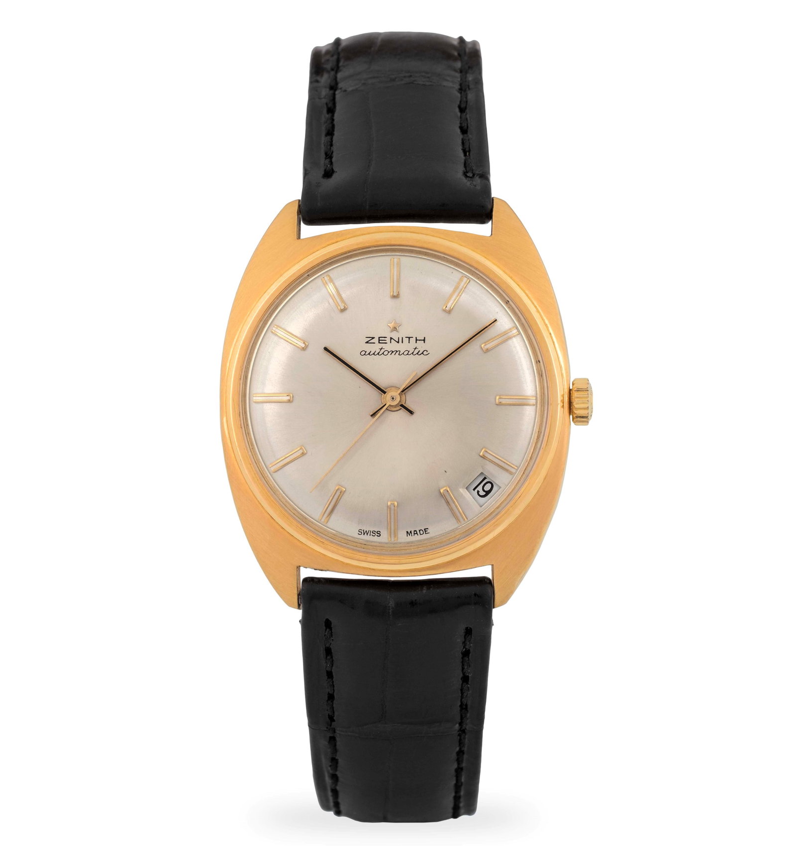 Zenith Stellina in yellow gold 18k with silvered dial and applied indexes, circa 1970: Brand: Zenith Model: Stellina Year: circa 1970 Reference: 3329 Dial: Champagne Case N°: 083E959 Movement: Automatic Cal: 2562-PC Material: Yellow gold 18k Strap: Leather Size: 34 mm