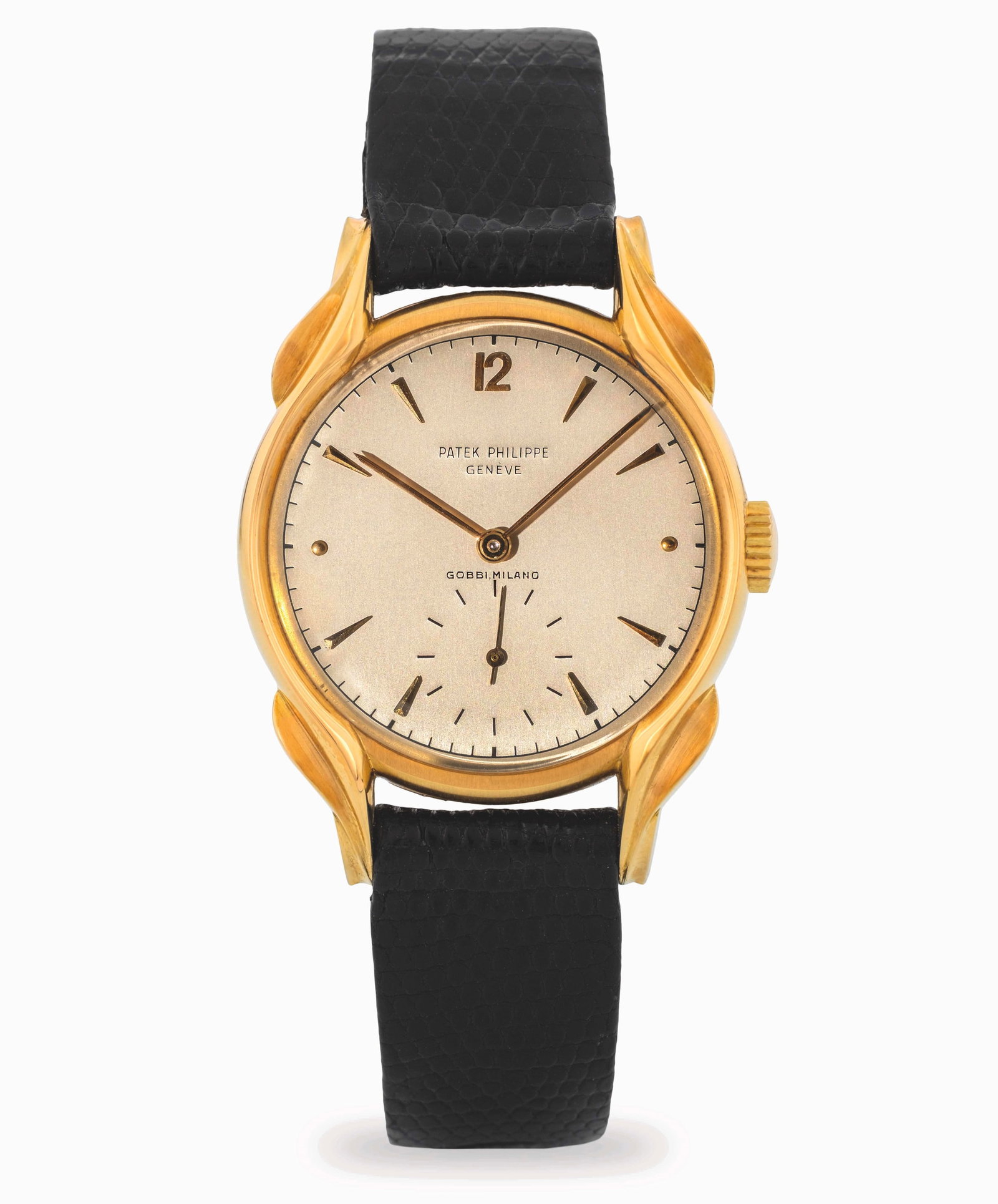 Patek Philippe Calatrava Ref. 2431 Flame Lugs, signed “Gobbi Milano??, with applied indexes and: Brand: Patek Philippe Model: Calatrava Year: circa 1950 Reference: 2431 Dial: Argenté with applied indexes Case N°: 660.XXX Movement: Manual winding Cal.: 12-120 Movement N°: 967.XXX Material: yell