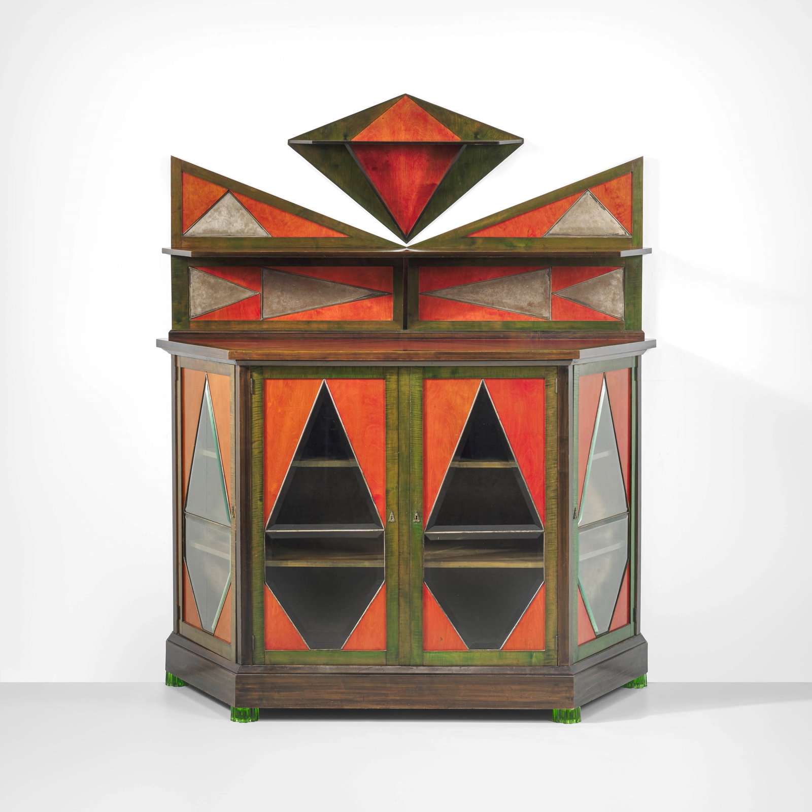 Gerardo Dottori Storage cabinet: Wooden structure and wood painted with aniline. Glass and metal details. Coloured glass supports. From the furnishings of Casa Cimino. Italy, c. 1930. Gerardo Dottori designed these furnishings in the
