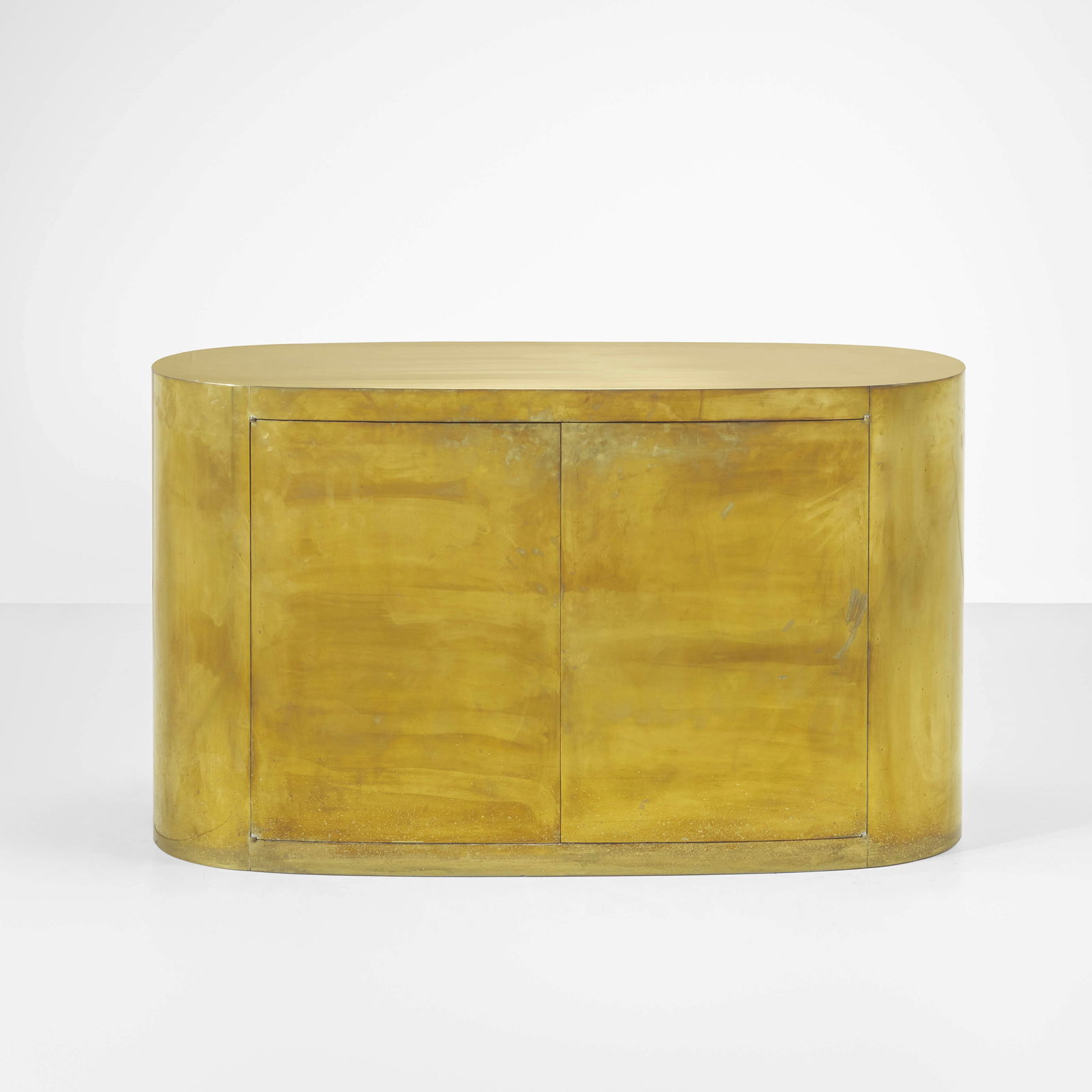 Gabriella Crespi Oval bar from the Menhir Series: Wooden structure, laminated wood and brass. Signature and numbering engraved. Private collection. Recorded by Archivio Gabriella Crespi. Crespi, Italy, 1978. We are delighted to present an important c