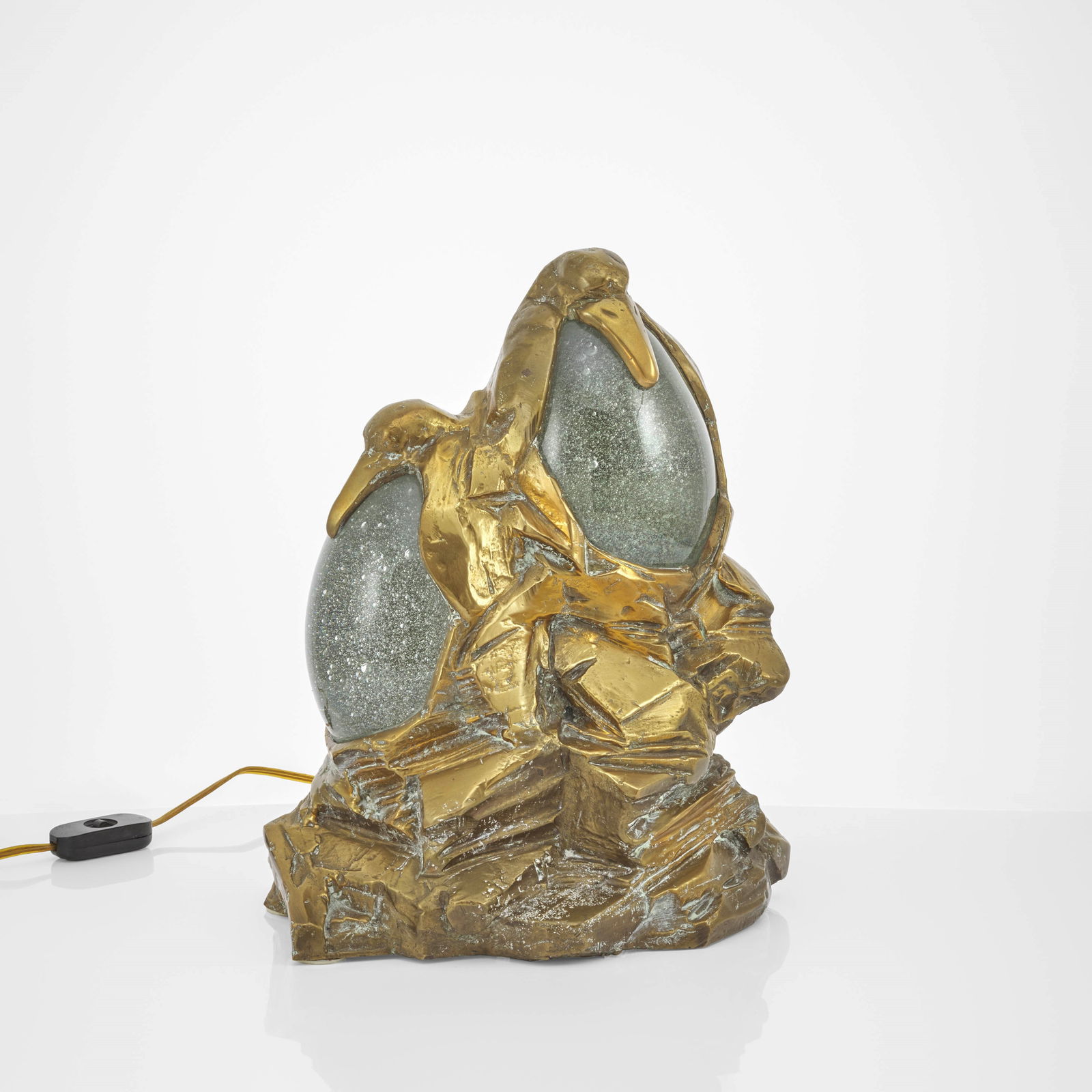 Gabriella Crespi Table lamp mod. Tre Pinguini: From the series Animali. Lost wax cast bronze structure. Eggs in Barovier & Toso Murano blown glass. Engraved signature. Private collection. Recorded by Archivio Gabriella Crespi. Crespi, Italy, 1974.