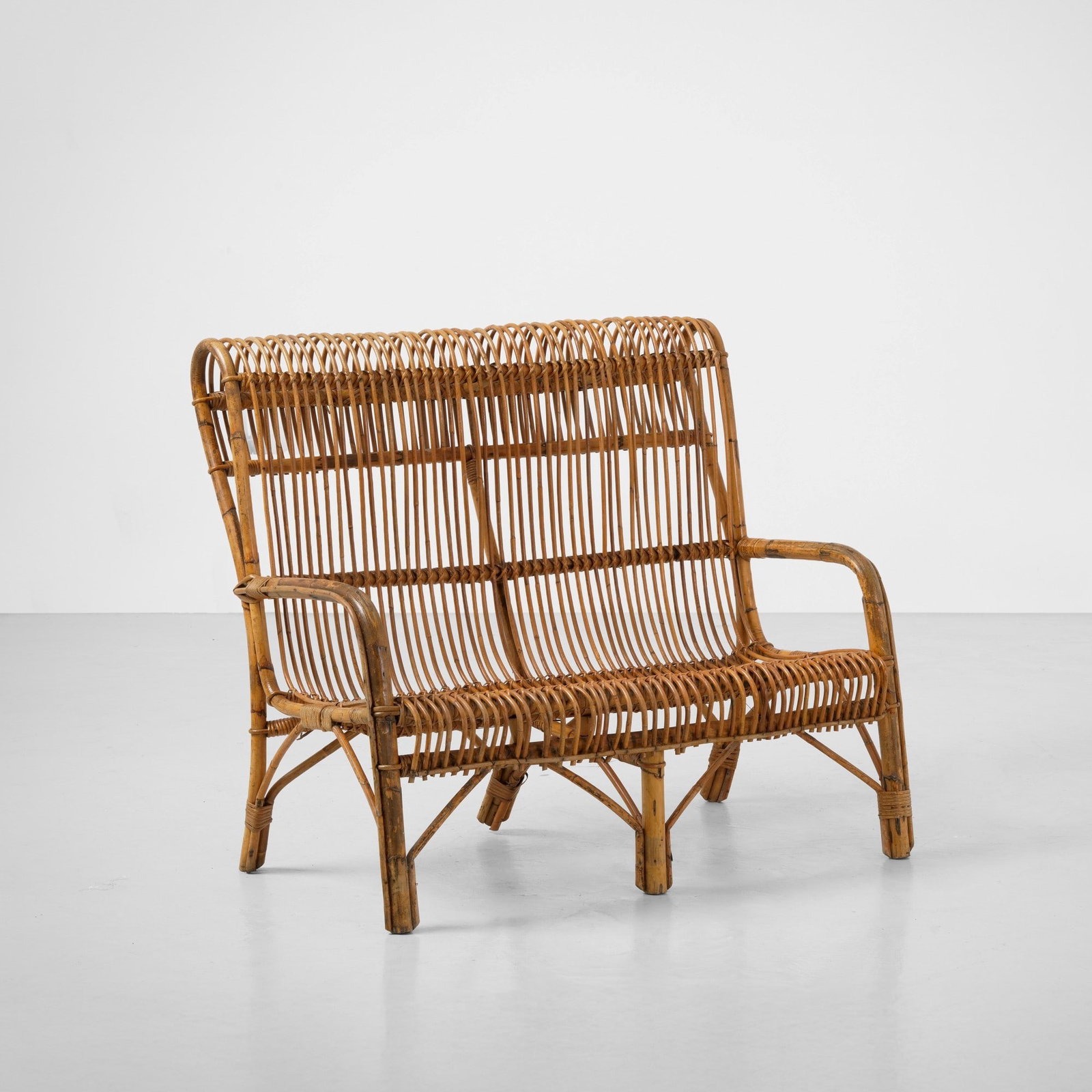 Divano: Struttura in bambù e canna d'India. Prod. Italia, 1960 ca.