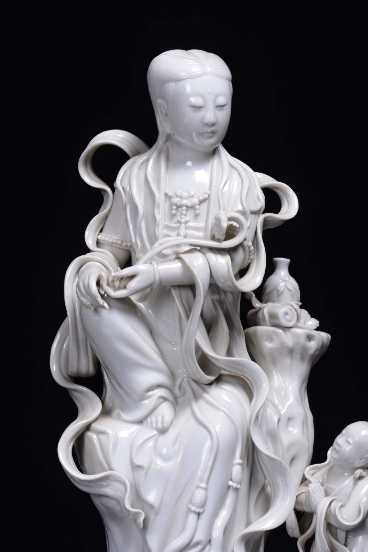 A Blanc de Chine porcelain Guanyin with child, China, 2 - 3