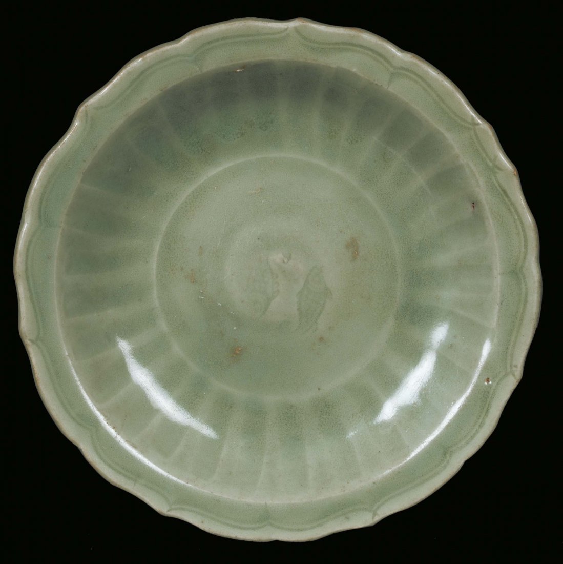 A Longquan Celadon porcelain plate with fishes, China, 