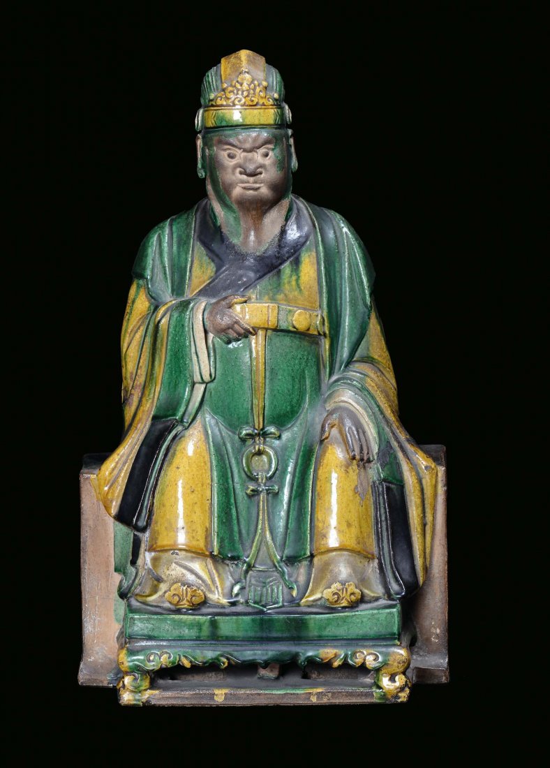 A large enamelled stoneware sitting Dignitary figure, C