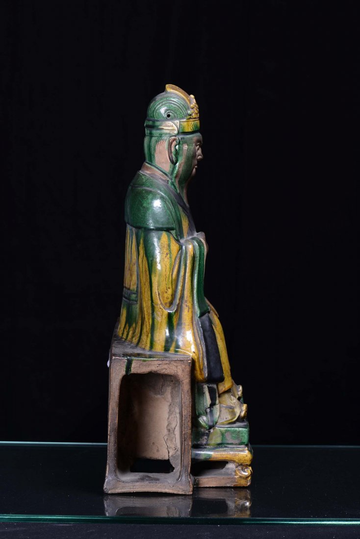 A large enamelled stoneware sitting Dignitary figure, C - 2