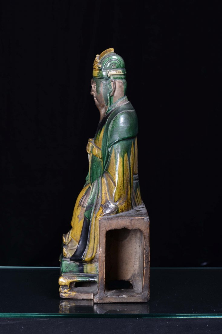A large enamelled stoneware sitting Dignitary figure, C - 3