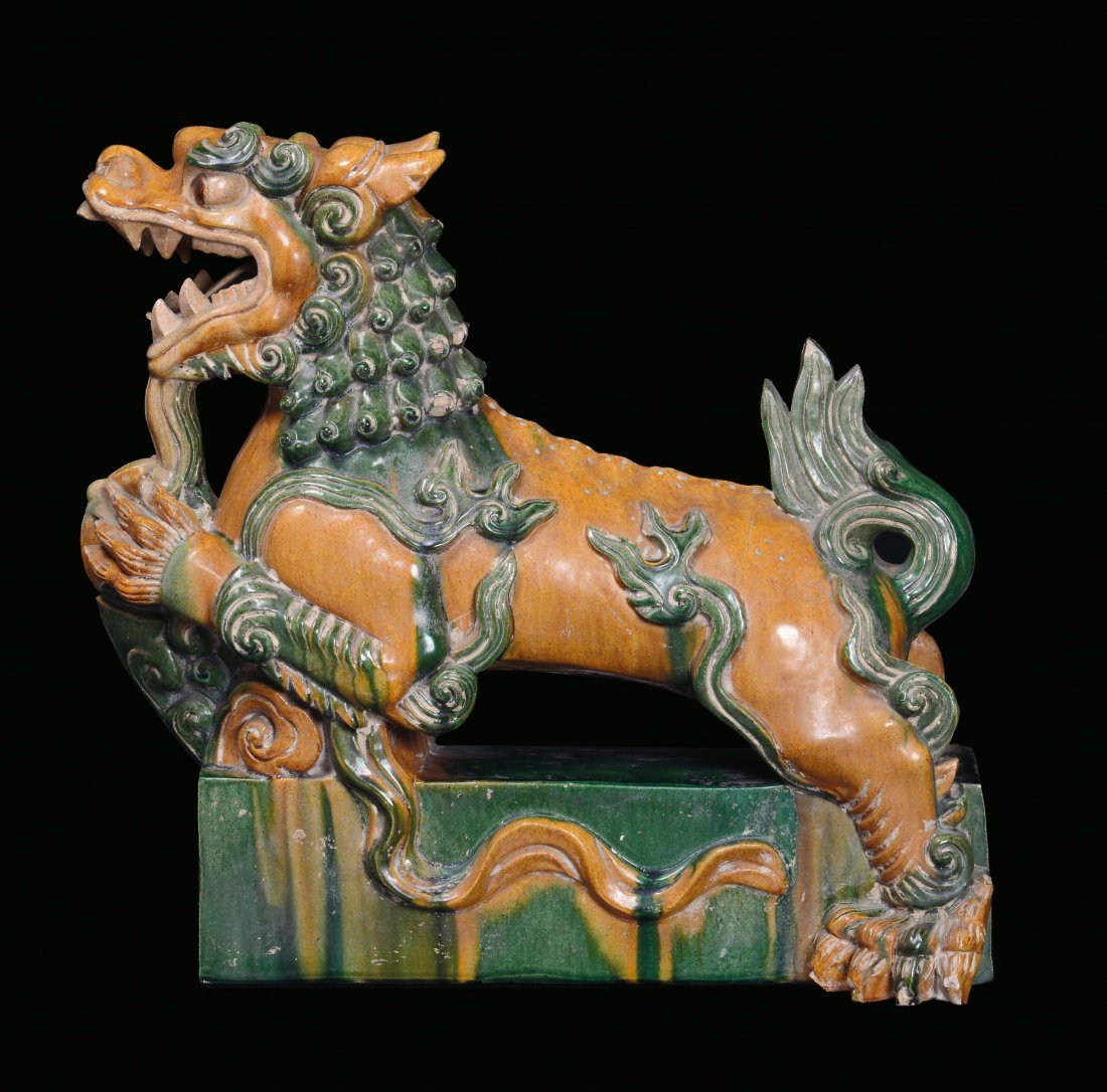 A large glazed stoneware tile representing a Pho dog, C